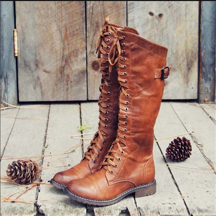 Women's knee-high lace-up riding boots for casual everyday wear. Comfortable and stylish fall/winter footwear.