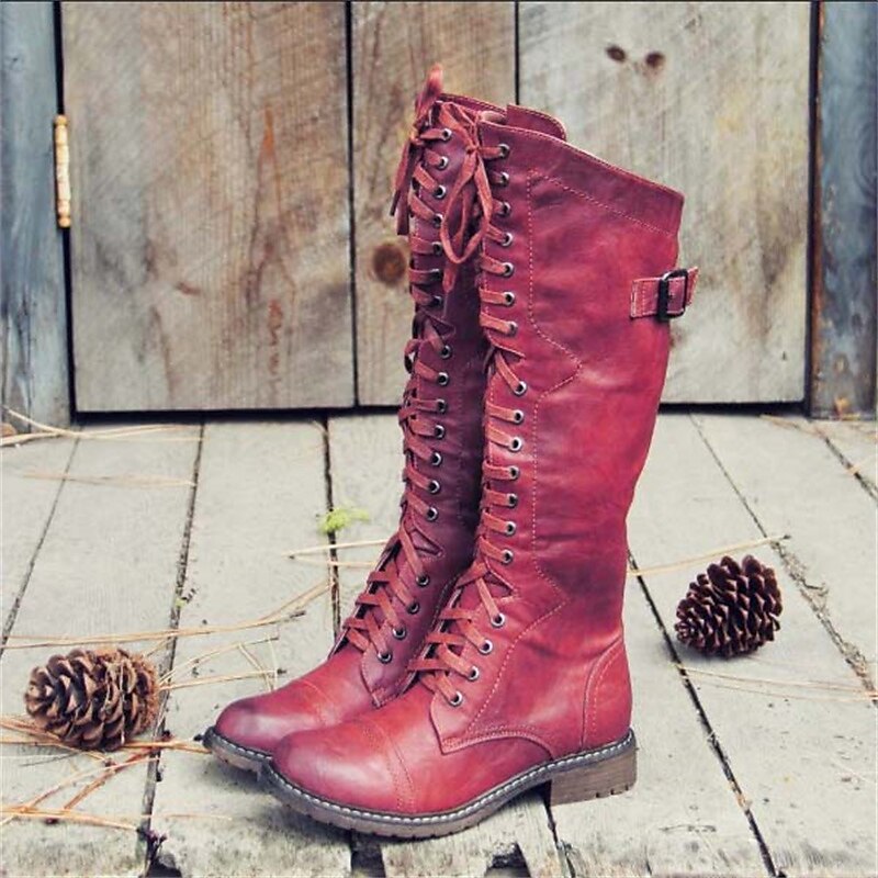 Stylish women's lace-up knee-high riding boots. Perfect casual everyday footwear with a versatile design.
