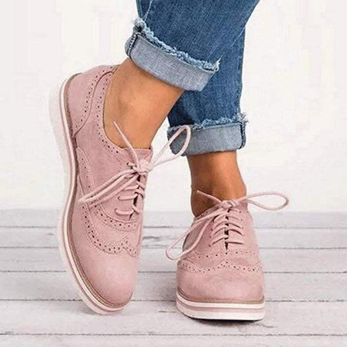Women's Lace-Up Oxford Sneakers with classic brogue details, perfect for smart-casual everyday wear.