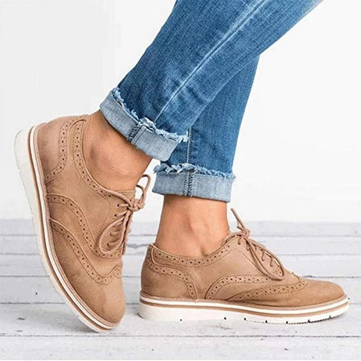 Pink Women's Lace-Up Oxford Sneakers with brogue details. Comfortable and stylish for casual outfits.