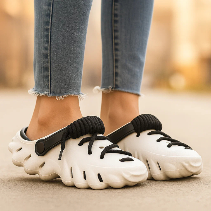 Versatile women's slip-on clogs with laces, perfect for comfort and ease of wear.
