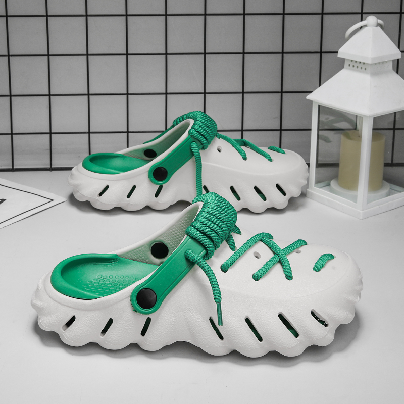 Women's everyday clogs, laced for a secure fit, offering breathable and water-friendly comfort.