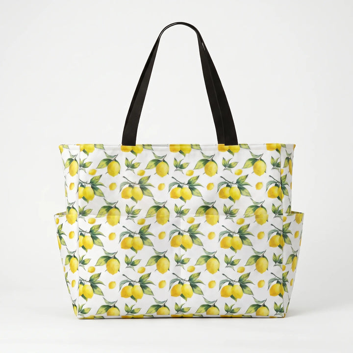 Stylish tropical lemon print large beach tote for women, a must-have summer bag and vacation accessory.