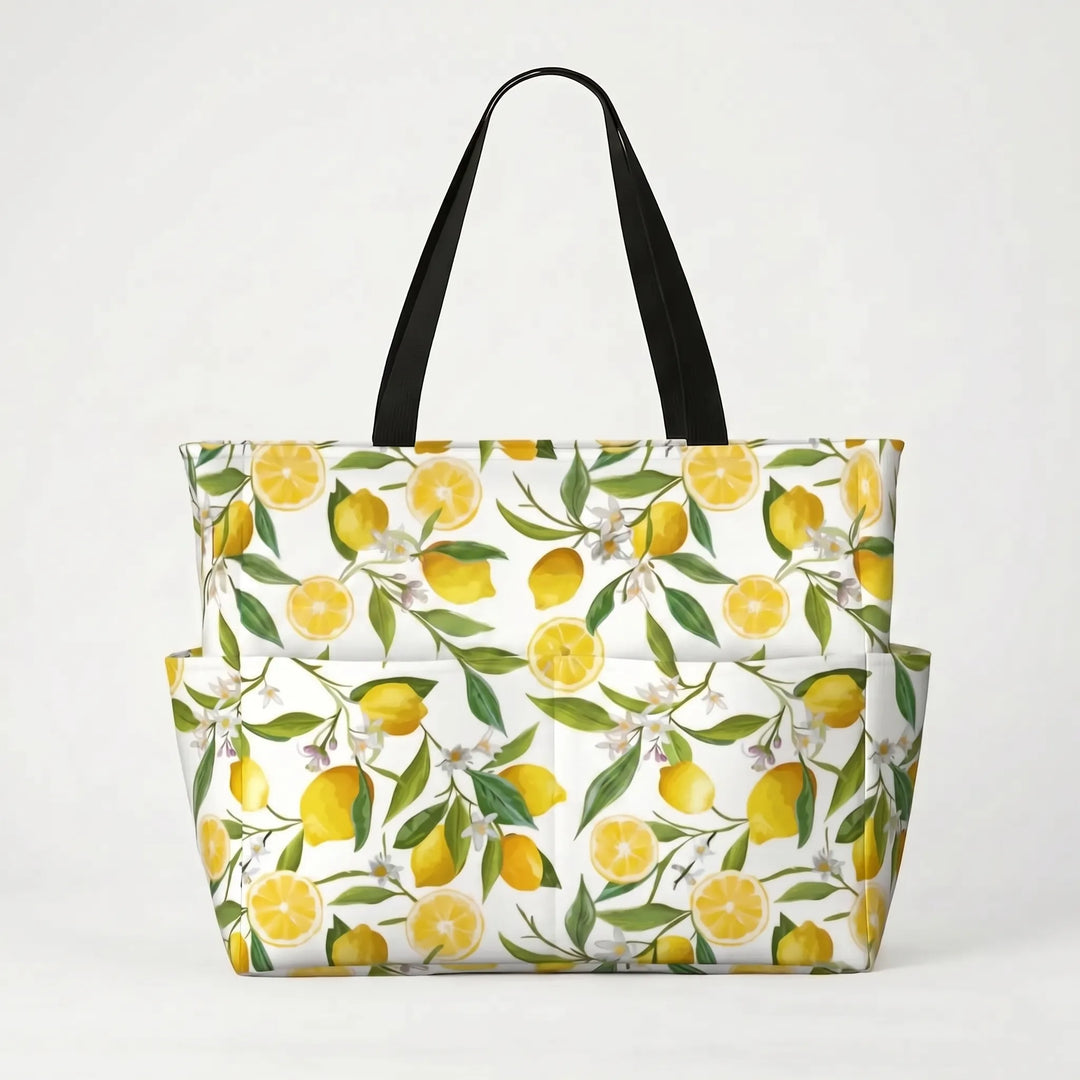 Spacious women's large beach shopper bag showcasing a lively tropical lemon print. Great for all essentials.