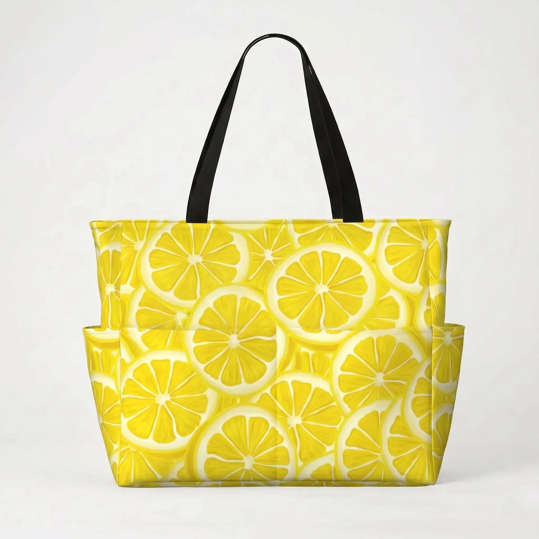 Tropical lemon print women's travel tote bag, a large and water-resistant accessory for beach trips.