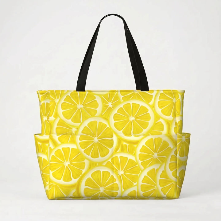 Tropical lemon print women's travel tote bag, a large and water-resistant accessory for beach trips.