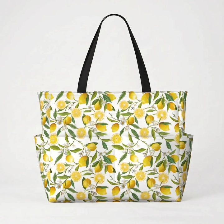 Close-up of the bright tropical lemon print on a water-resistant women's large beach tote bag.