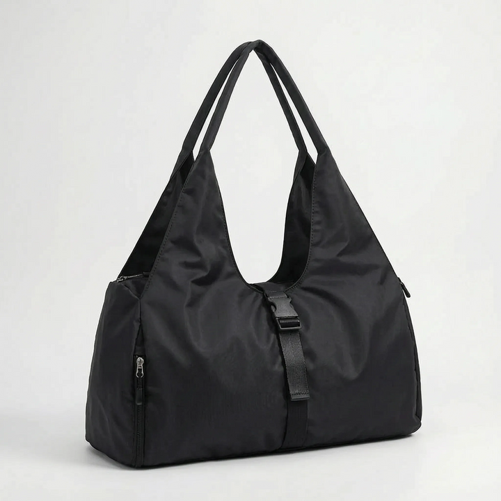 Versatile women's large capacity gym duffel bag in pink or black. Perfect sports tote, yoga bag, or travel weekend shoulder bag.