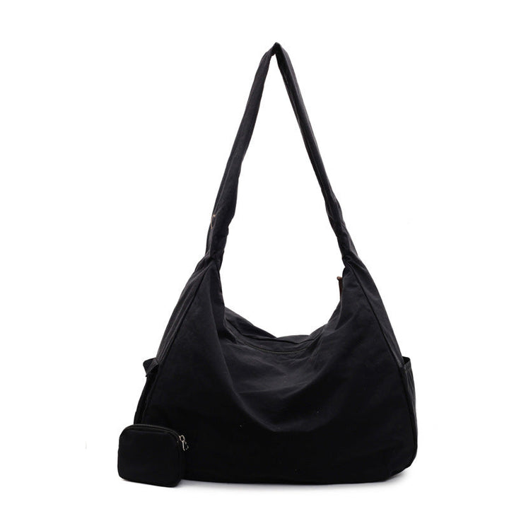 Organized women's large capacity crossbody bag, perfect for daily necessities.