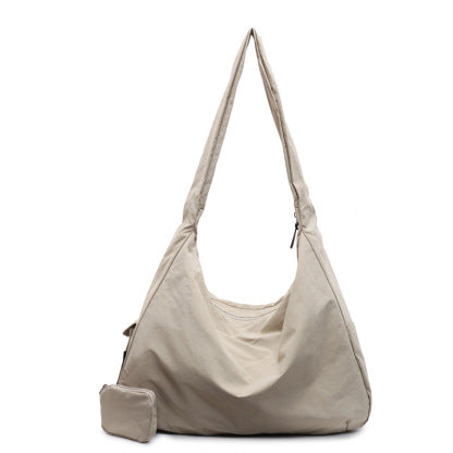 Slouchy large capacity crossbody bag for women, a comfortable shoulder accessory.