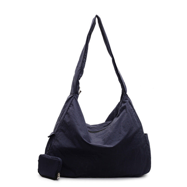 Women's large capacity handbag, versatile crossbody and shoulder bag for daily fashion.