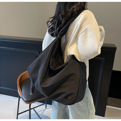 Women's large capacity slouchy crossbody shoulder bag, practical & stylish handbag.