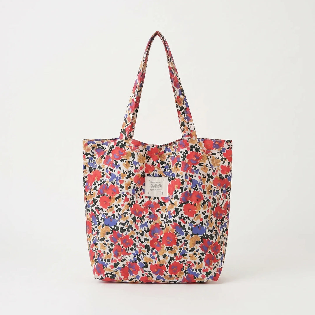 Women's floral print large tote bag with comfortable shoulder straps, a practical fashion bag.