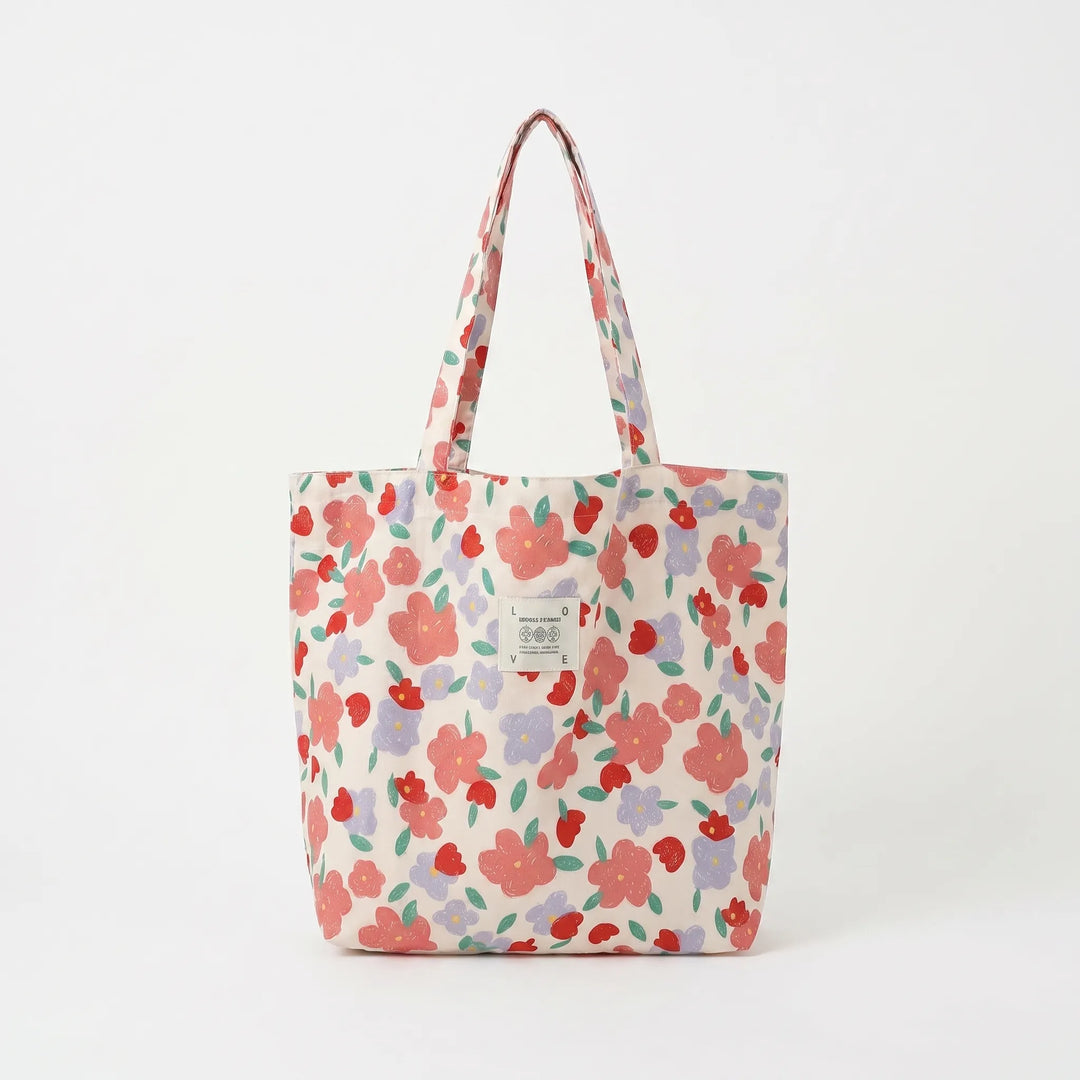 Durable large floral print travel tote bag for women, perfect as a carry-all shoulder bag.