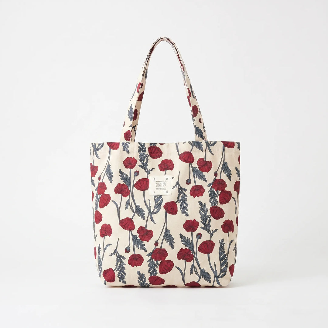 Spacious women's floral print tote bag with comfortable shoulder strap, ideal for summer travel.