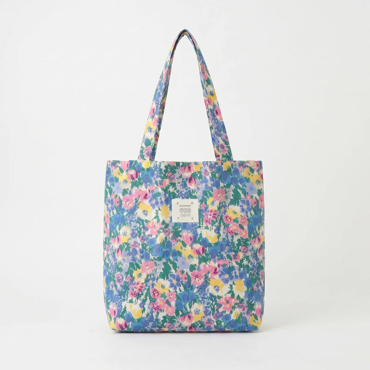 Vibrant floral print large shoulder tote for women, a versatile fashion & travel accessory.