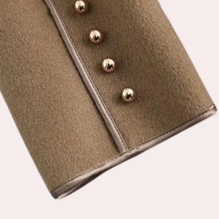 Elegant women's belted layered jacket with a tailored design, suitable for formal occasions and everyday wear.