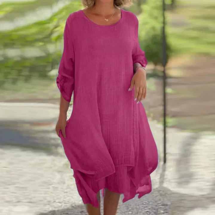 Women's layered midi dress with 3/4 sleeves, perfect for casual summer wear and everyday elegance.