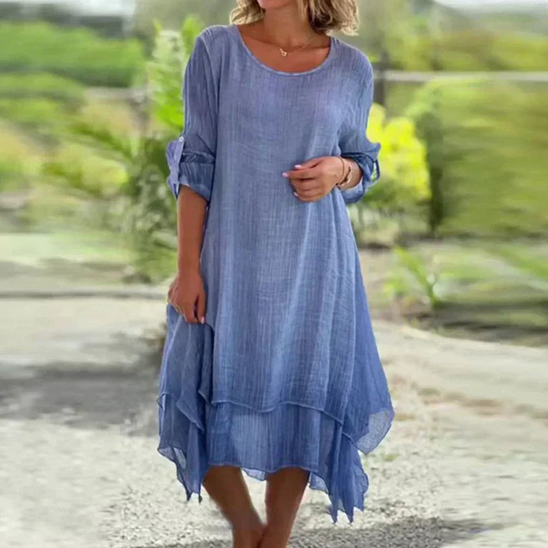 Chic women's layered midi dress with 3/4 sleeves, an elegant choice for summer casual and vacation styles.