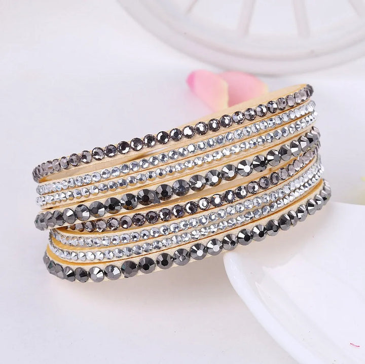 Luxurious women's layered rhinestone bracelet, adjustable fit and brilliant shine.
