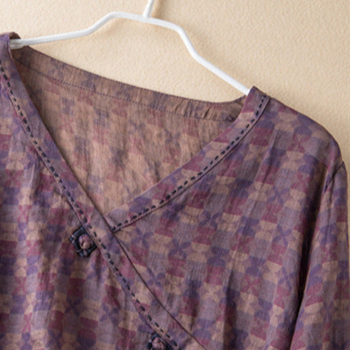Embroidered Leilani women's button-front blouse with floral design, relaxed fit, perfect for spring/summer.