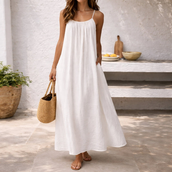 Elegant Women's Lena Spaghetti Strap Maxi Sundress, long & flowing for vacation outfits.