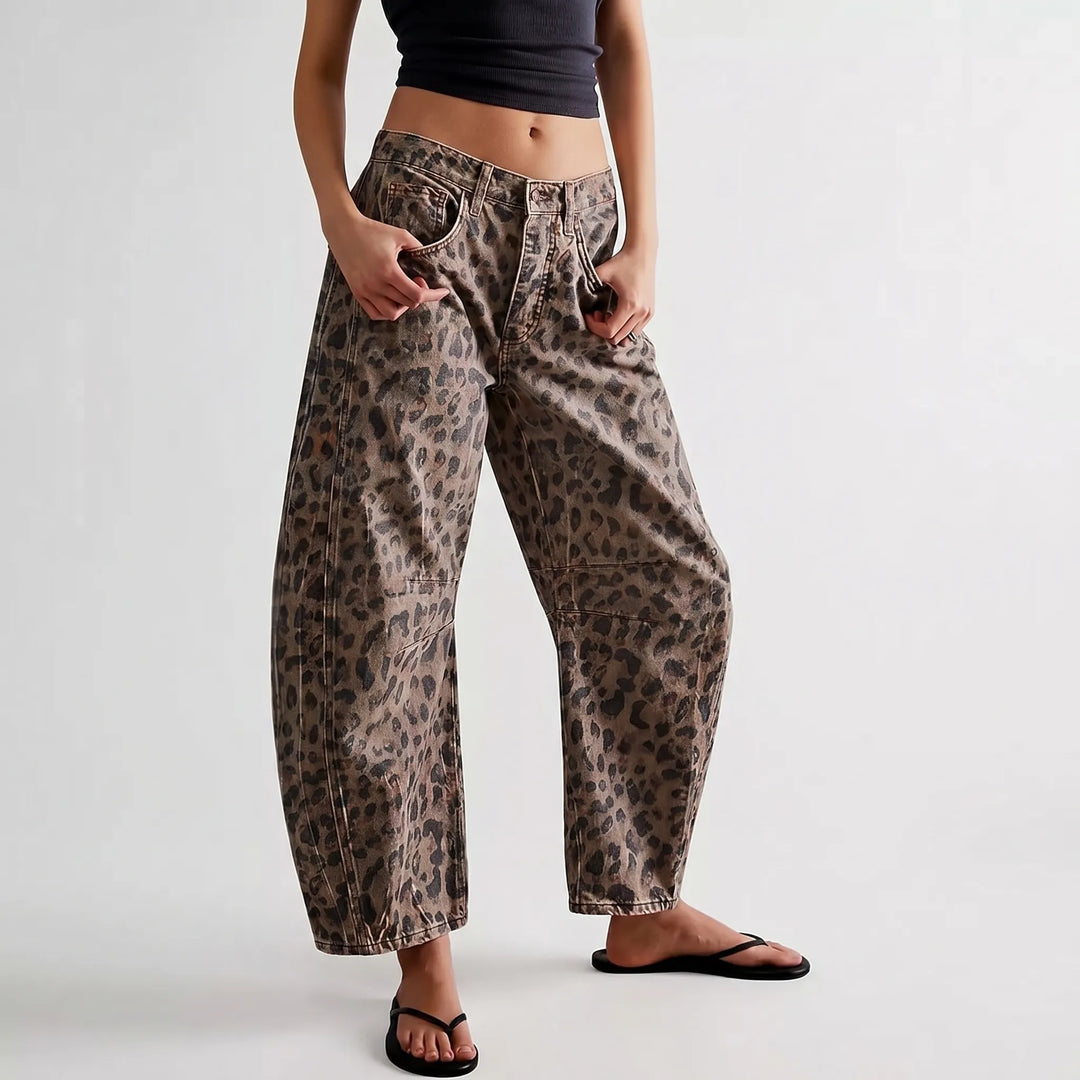 Stylish brown leopard-print barrel leg jeans for women, featuring a mid-rise waist and ankle-length cut.