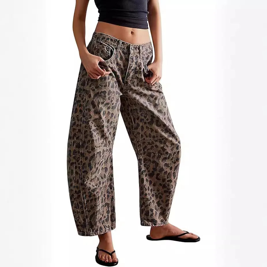 Unique patterned denim: women's mid-rise leopard-print barrel jeans, designed for a modern yet relaxed look.