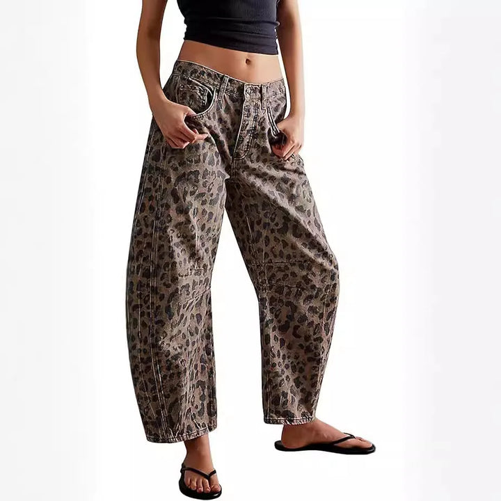 Unique patterned denim: women's mid-rise leopard-print barrel jeans, designed for a modern yet relaxed look.