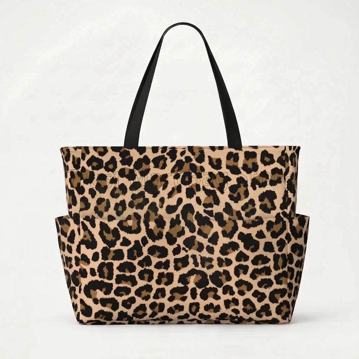 Durable water-resistant leopard print women's beach tote, spacious & stylish travel bag.