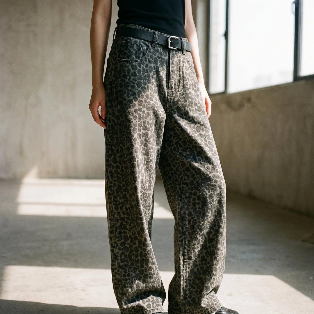 Women's leopard print high-waisted wide-leg pants. Trendy animal print, comfortable fit for stylish casual or streetwear.