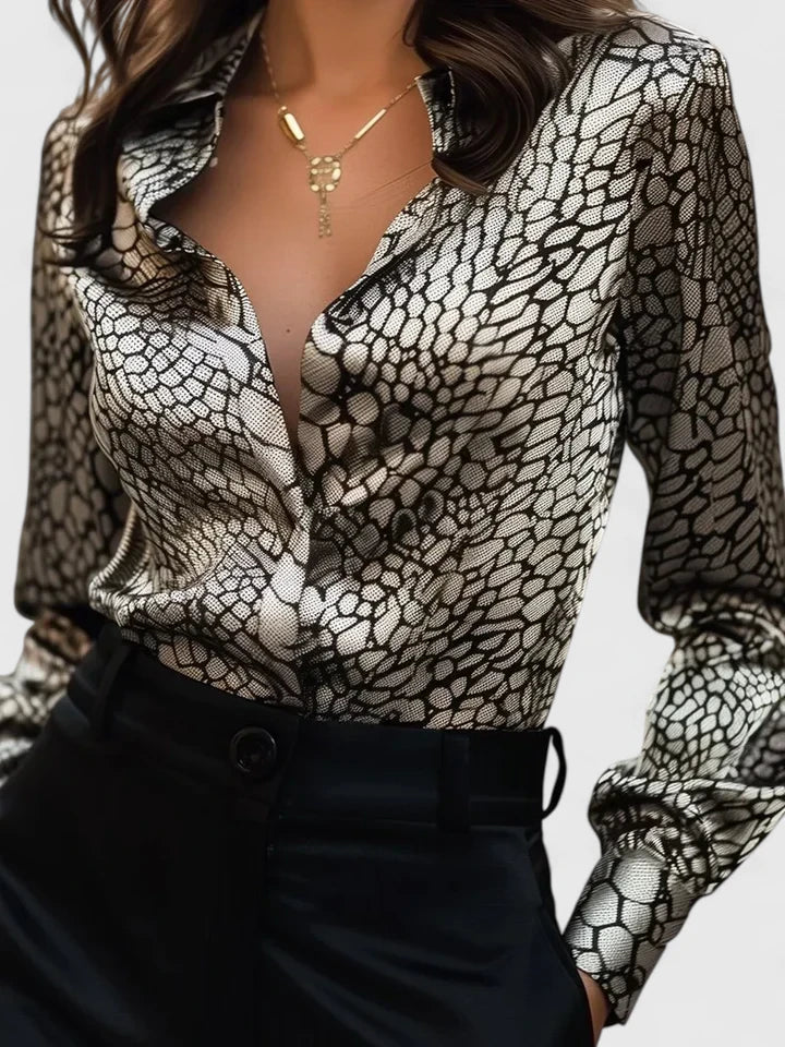 Chic women's leopard print long sleeve blouse with collar. Ideal for office wear & versatile styling.