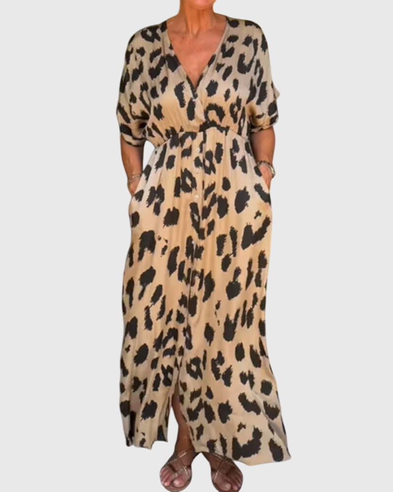 Women's leopard print V-neck maxi dress with elastic waist & button front. Flowy summer fashion.