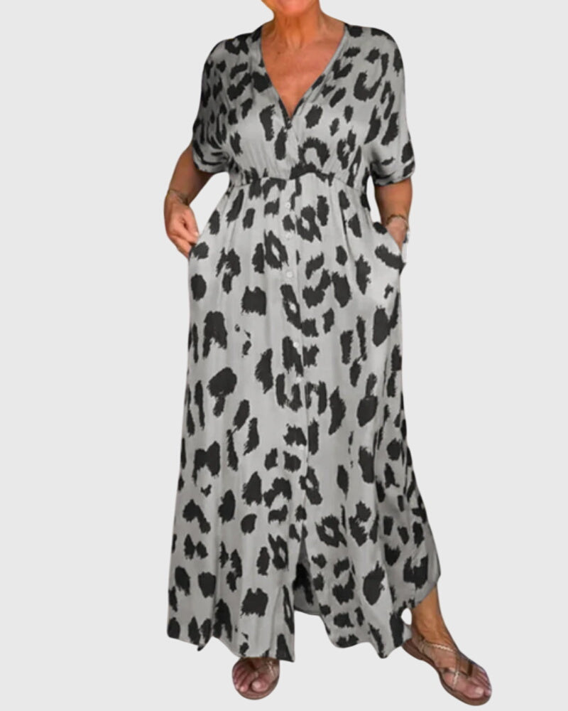 Elegant women's leopard print V-neck maxi dress. Features elastic waist & button front. Comfortable summer wear.