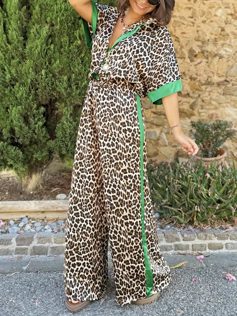 V-neck leopard print one-piece jumpsuit. Women's wide leg design for a comfortable, stylish look.