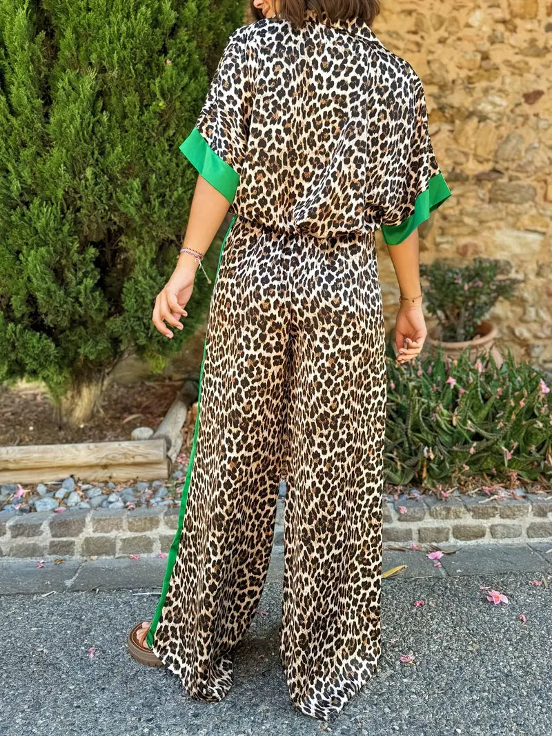 Versatile women's leopard print wide leg jumpsuit with v-neck. A trendy animal print fashion piece.