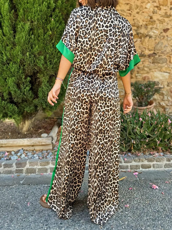 Versatile women's leopard print wide leg jumpsuit with v-neck. A trendy animal print fashion piece.