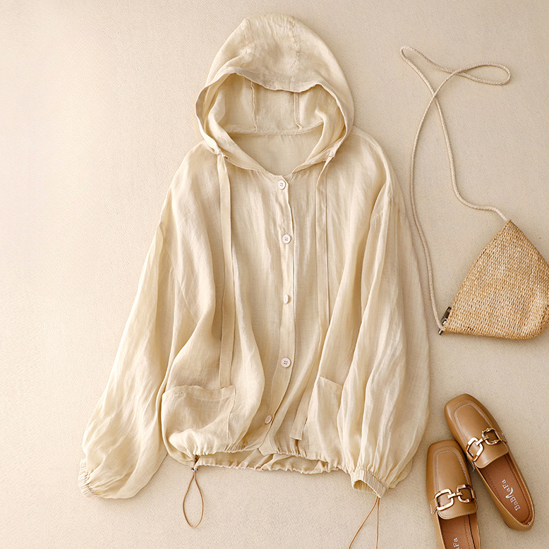 Women's lightweight airy pullover hoodie with balloon sleeves, button front, and relaxed fit for spring/summer comfort.