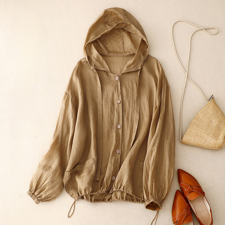Women's lightweight pullover hoodie with a relaxed fit, airy fabric, button front, and trendy balloon sleeves.
