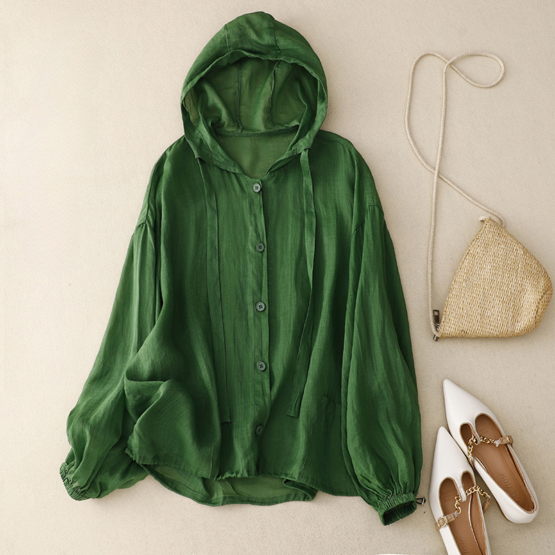 Airy women's hooded top, perfect lightweight pullover for spring and summer fashion. Chic relaxed fit and button detail.