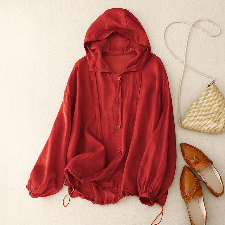 Stylish women's lightweight pullover hoodie with chic balloon sleeves and a functional button front for airy comfort.