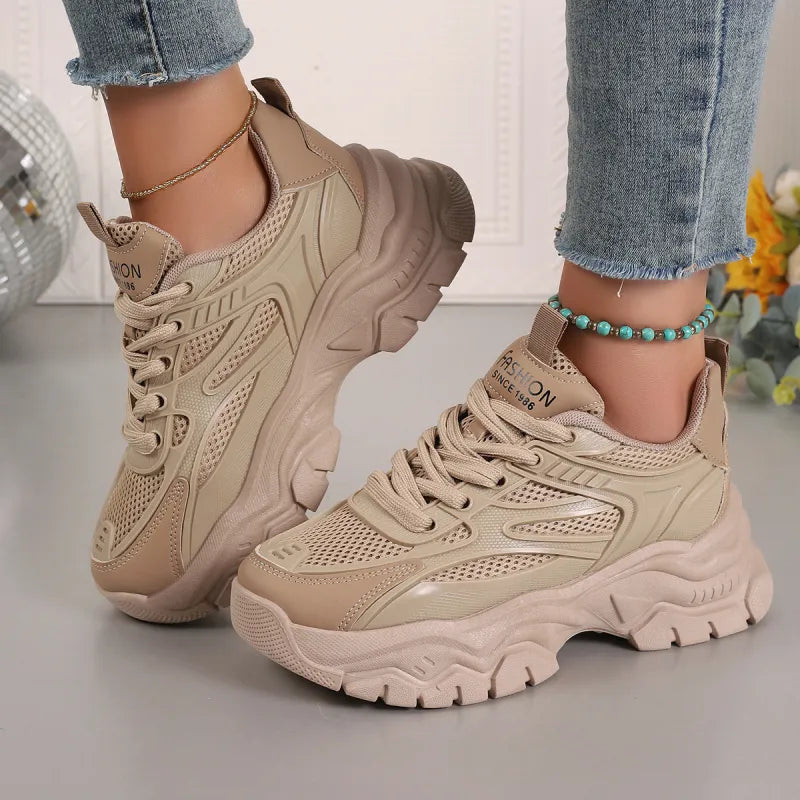 Chunky platform sole women's fashion sneakers, providing a stylish and comfortable fit for walking.