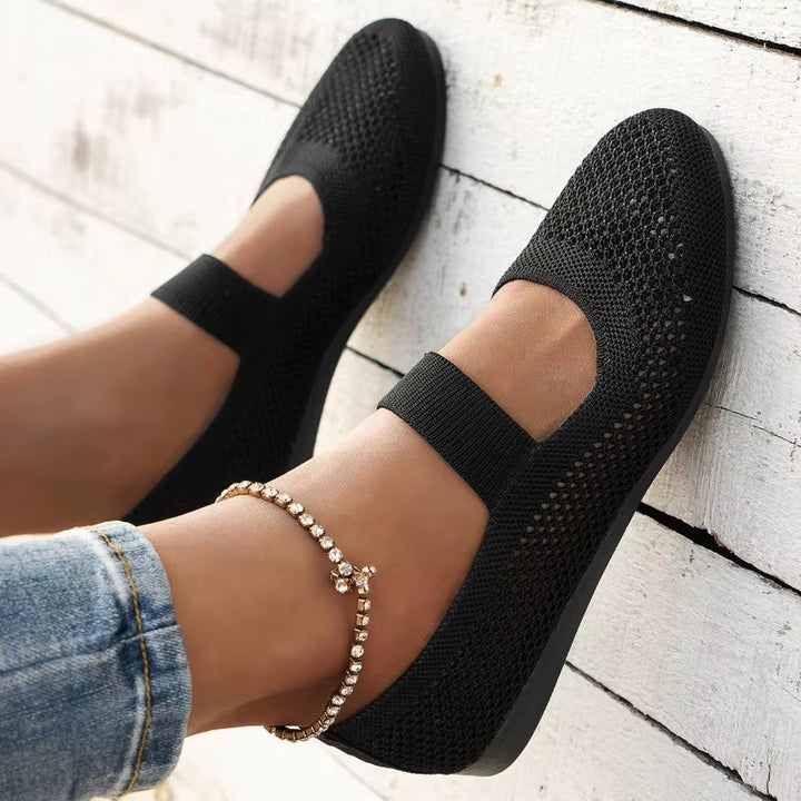 Barefoot walking shoes for women with wide toe box, promoting natural foot comfort & movement.