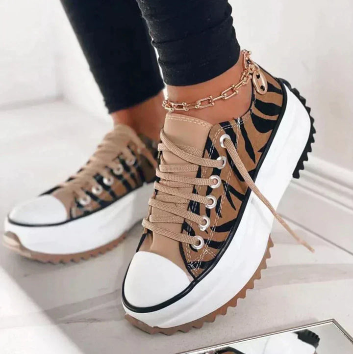 Woman wearing breathable, lightweight women's sneakers, enjoying all-day comfort during a walk.
