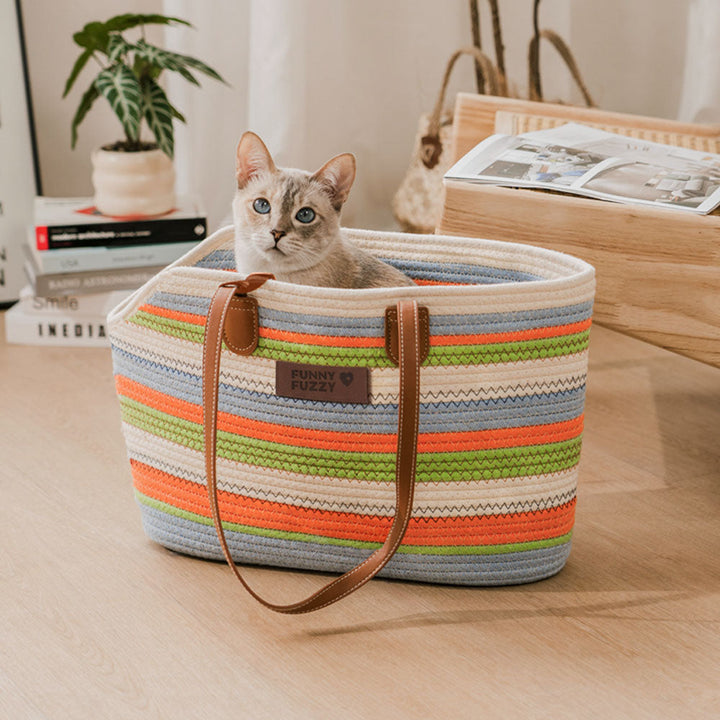 Lightweight cotton woven pet carrier beach bag with a smiling small dog inside, comfortable and eco-friendly.