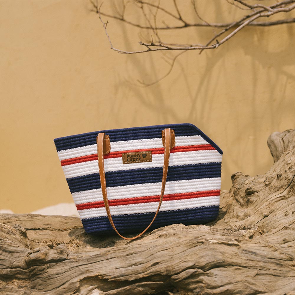Lightweight cotton woven pet carrier beach bag, an essential eco-friendly accessory for summer pet travel.