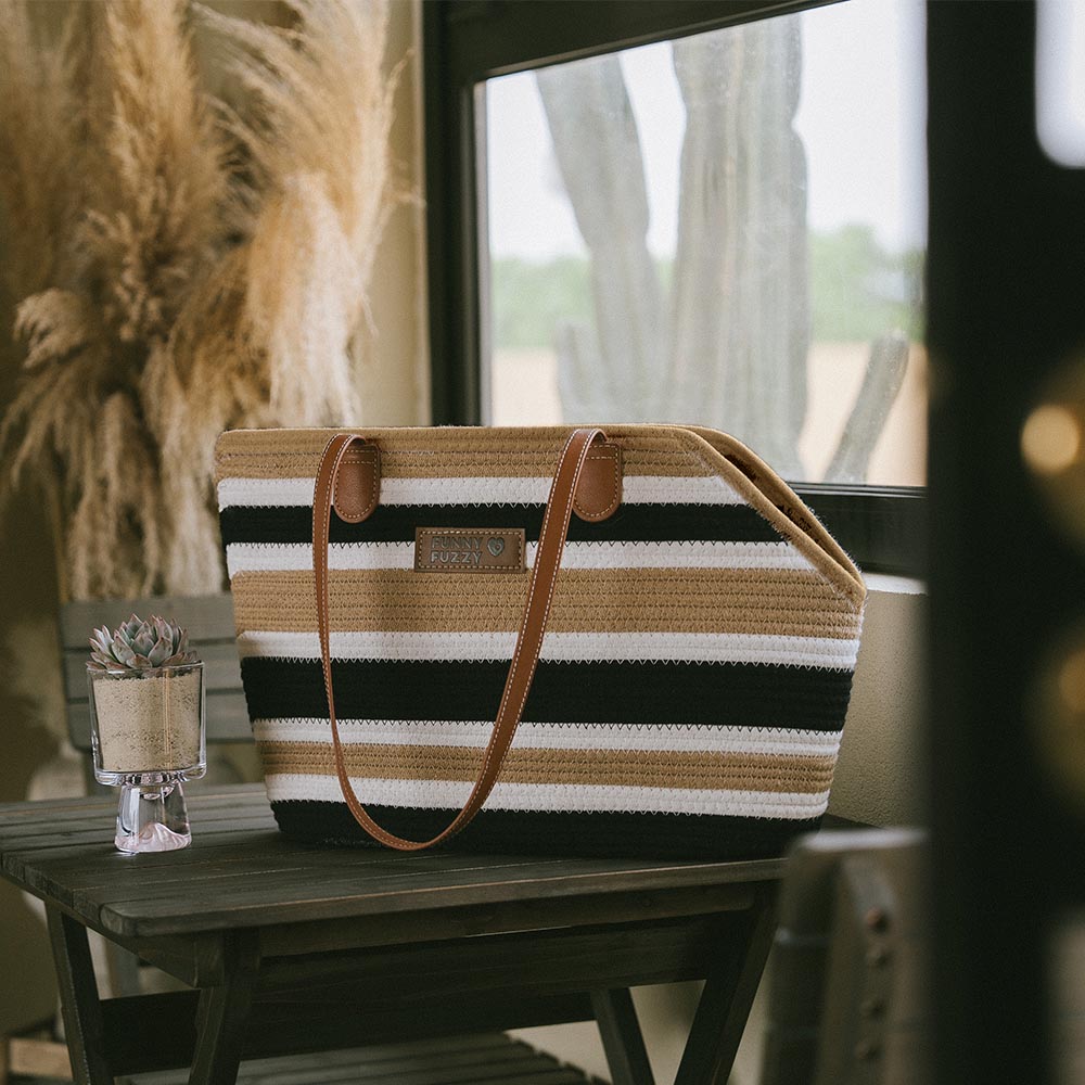 Overhead view of the lightweight cotton woven pet carrier beach bag, showing its open top design.