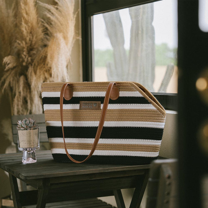 Overhead view of the lightweight cotton woven pet carrier beach bag, showing its open top design.