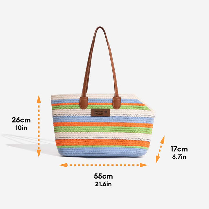 Lightweight cotton woven pet carrier beach bag with a small cat peeking out, eco-friendly & comfortable.