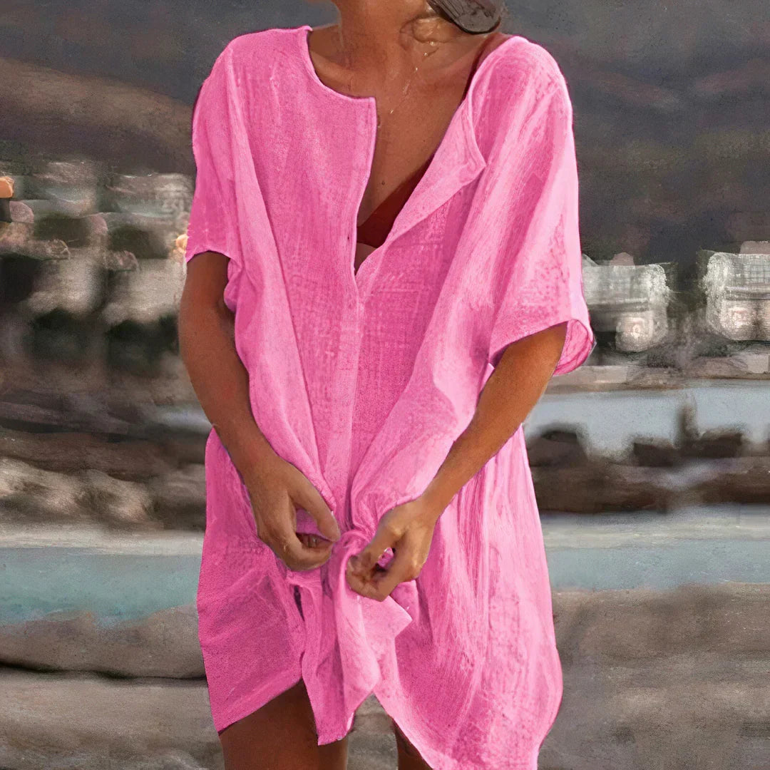 Effortless women's casual flowy beach dress, lightweight and comfortable for summer vacation or as a stylish cover-up.